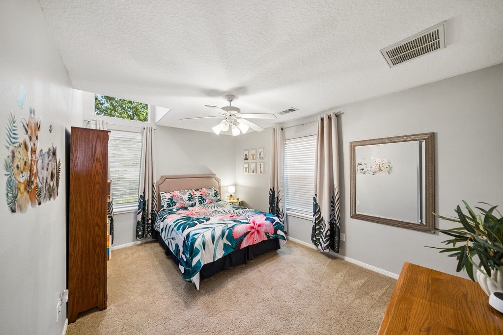1607 Schooner Point Willis, TX 77318 - Photo 27 of 47 Large secondary bedroom #2 is located upstairs!
