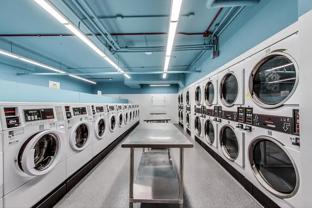 a utility room with dryer washer and dryer