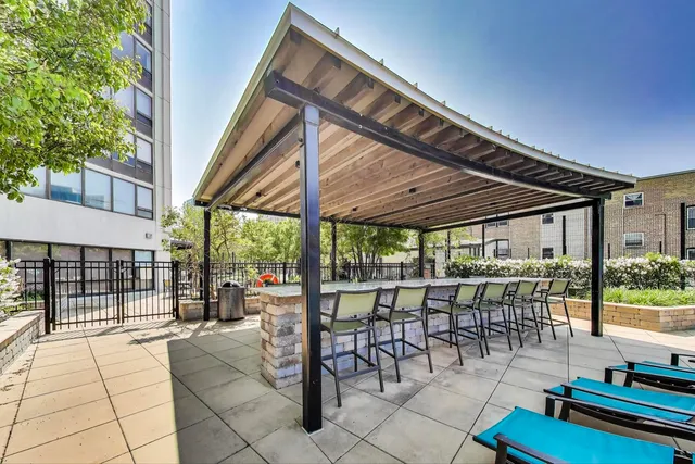 a view of a chairs and tables in the patio