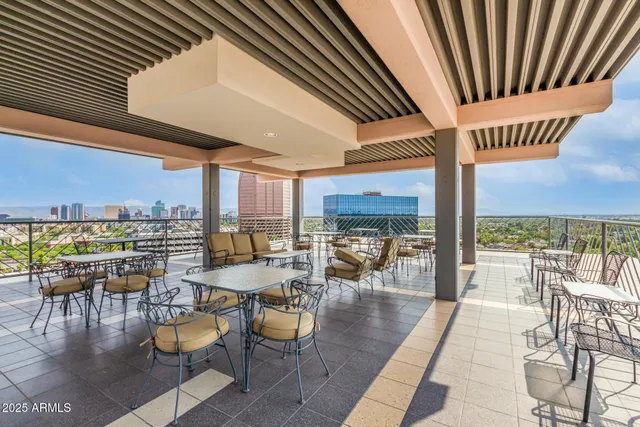 a dining space with furniture and outdoor view