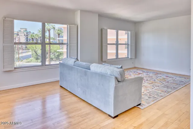 a living room with furniture and window