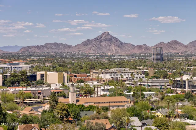a view of city and mountain