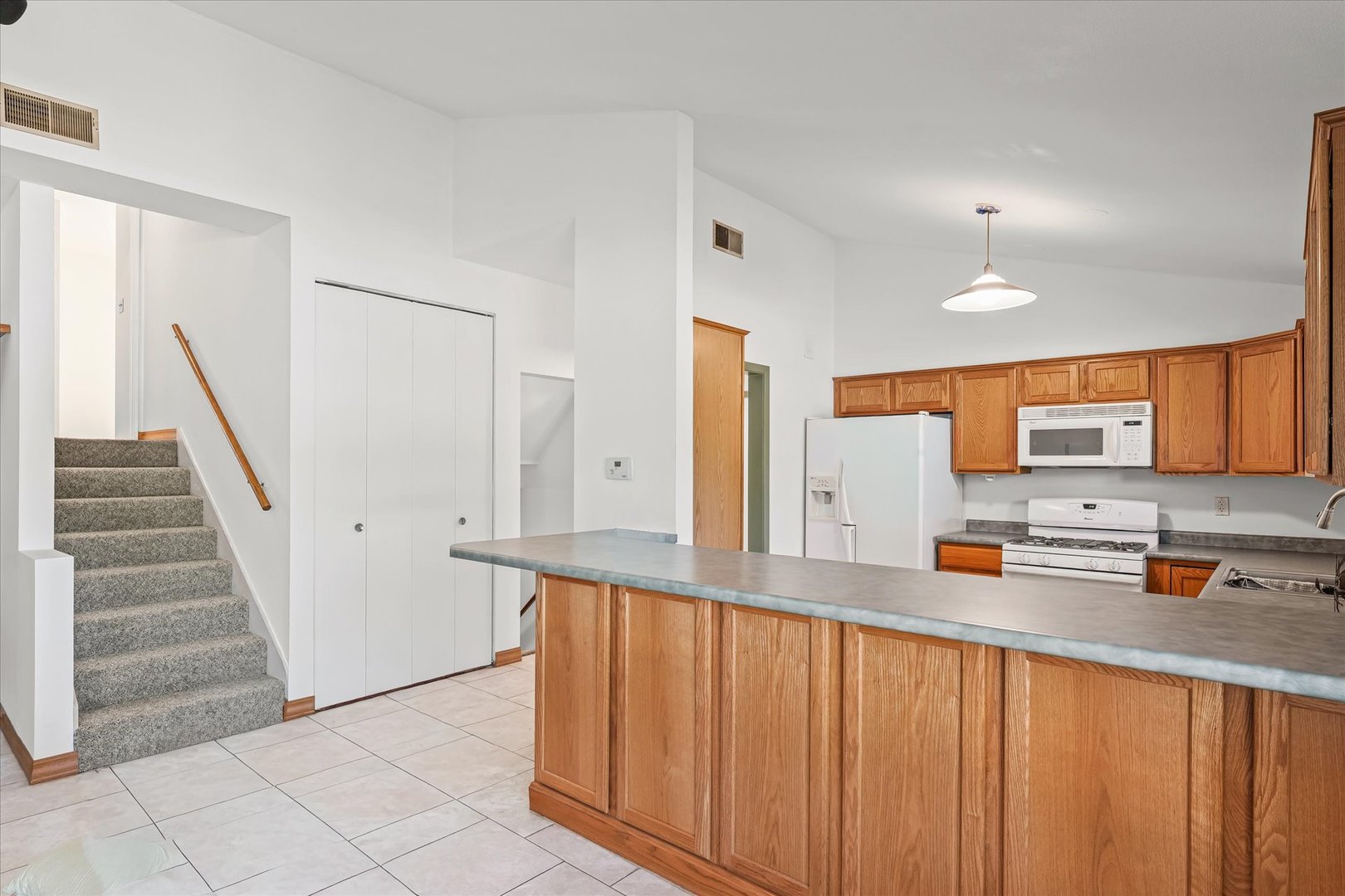 1602 Golfview Circle Rantoul, IL 61866 - Photo 14 of 36 a kitchen with stainless steel appliances a refrigerator sink and cabinets