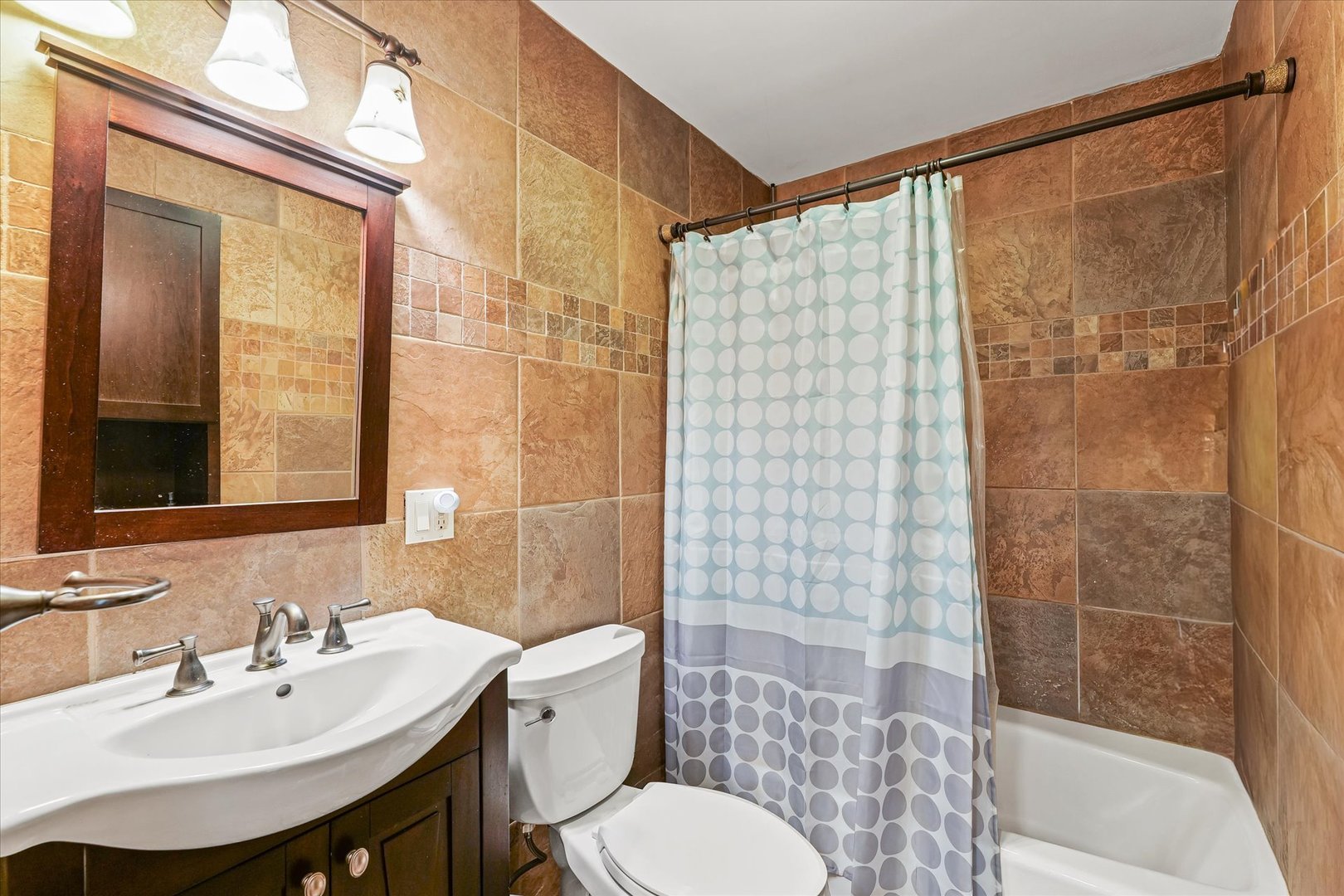 1602 Golfview Circle Rantoul, IL 61866 - Photo 18 of 36 a bathroom with a sink toilet and shower