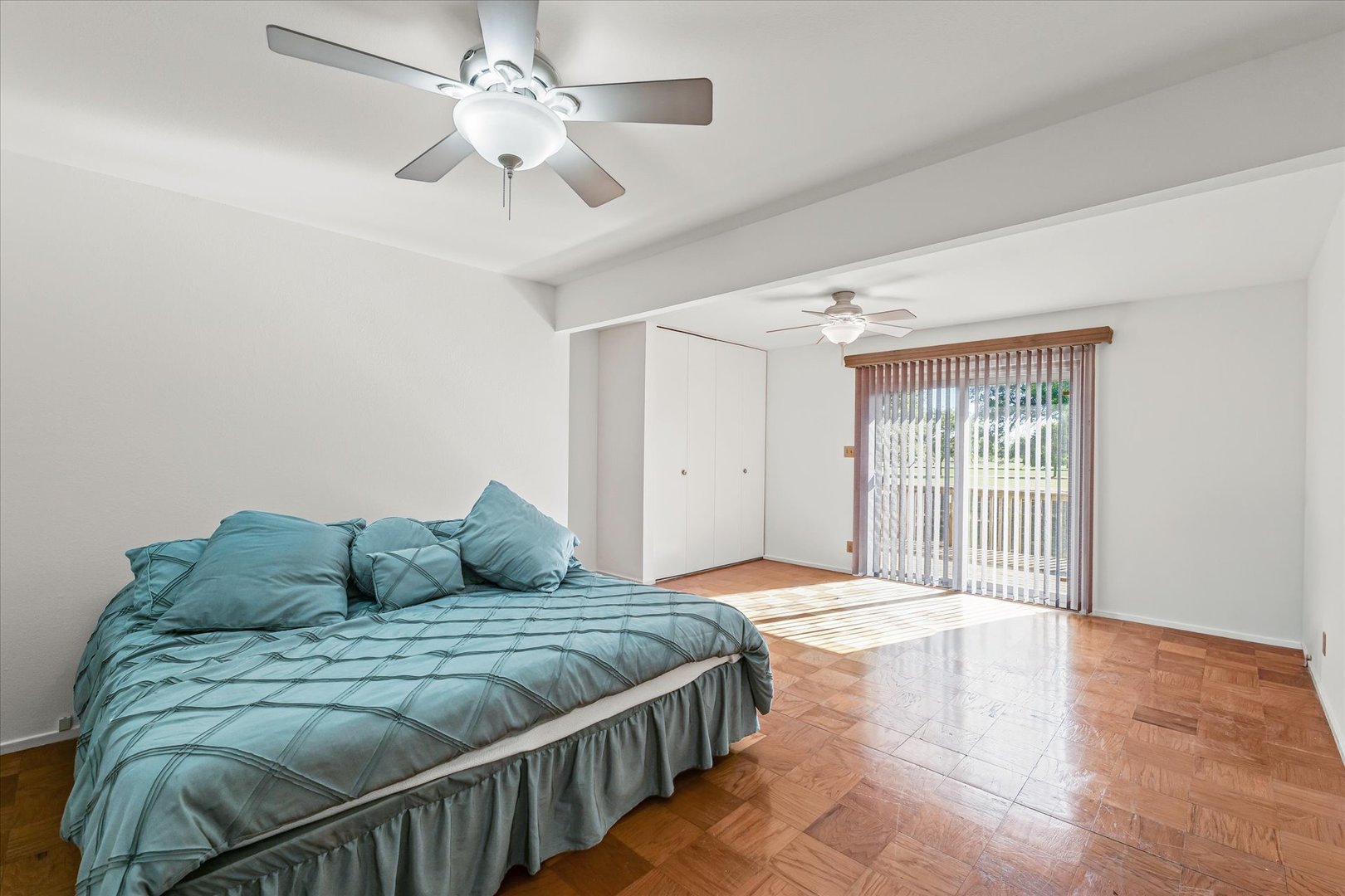 1602 Golfview Circle Rantoul, IL 61866 - Photo 22 of 36 a bedroom with a bed and ceiling fan