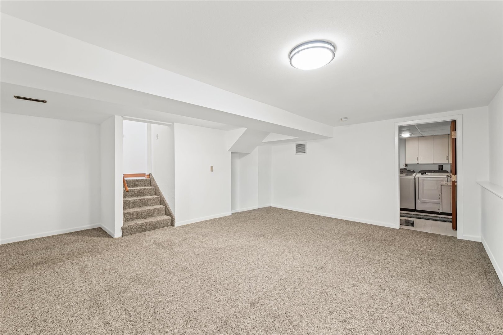 1602 Golfview Circle Rantoul, IL 61866 - Photo 26 of 36 a view of an empty room with a kitchen