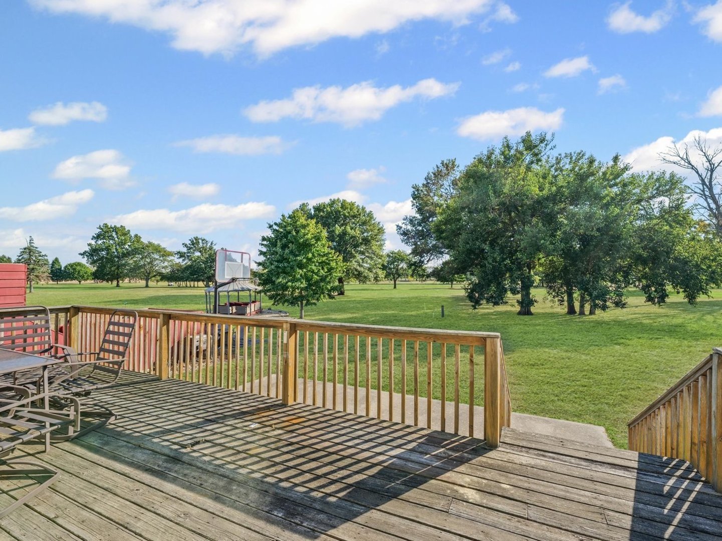 1602 Golfview Circle Rantoul, IL 61866 - Photo 34 of 36 a view of a wooden deck with a yard