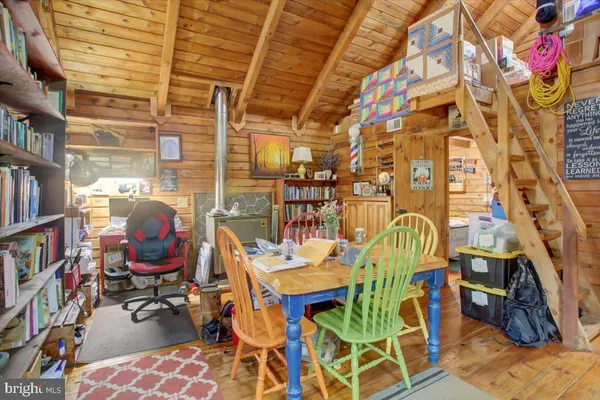 a view of a workspace with furniture