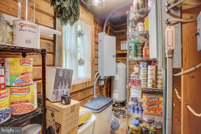 a bed room with a bed and a television