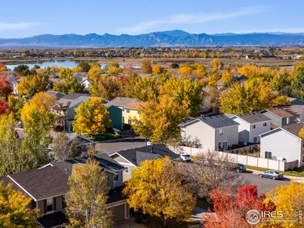 an aerial view of residential houses and outdoor space