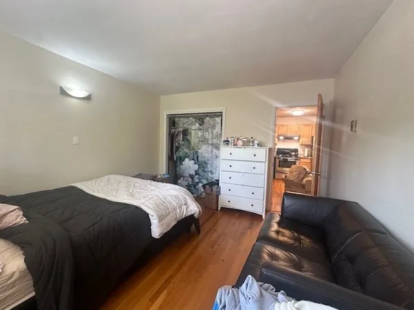 a bedroom with a bed and furniture
