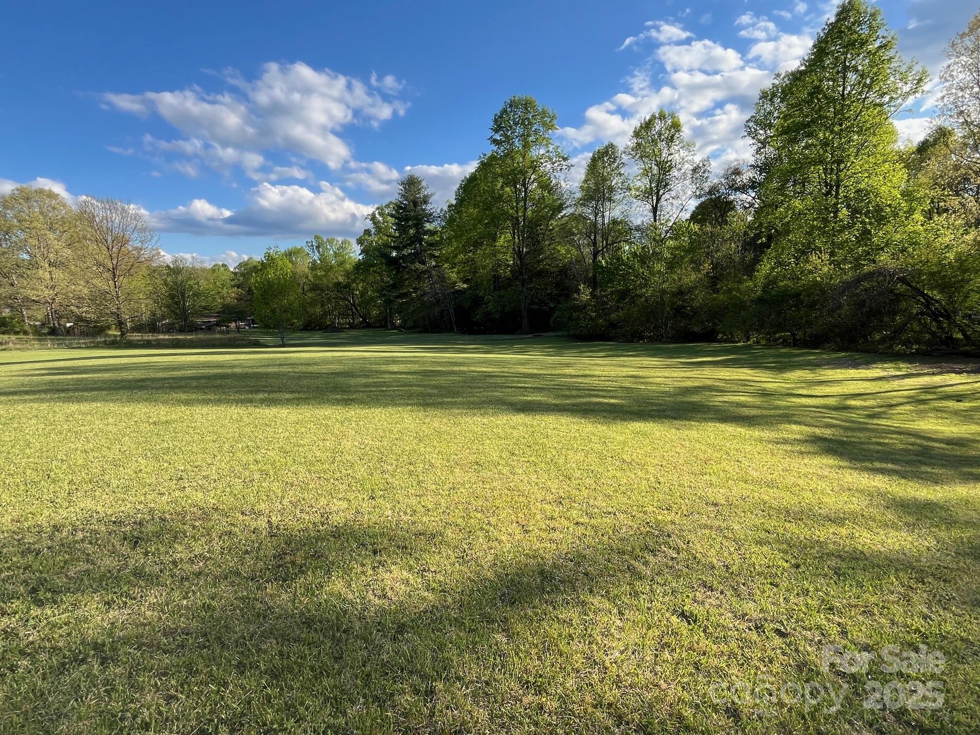 9999 Hunters Ridge Road, Unit 2 Mills River, NC 28759 - Photo 18 of 20 a view of an ocean and beach