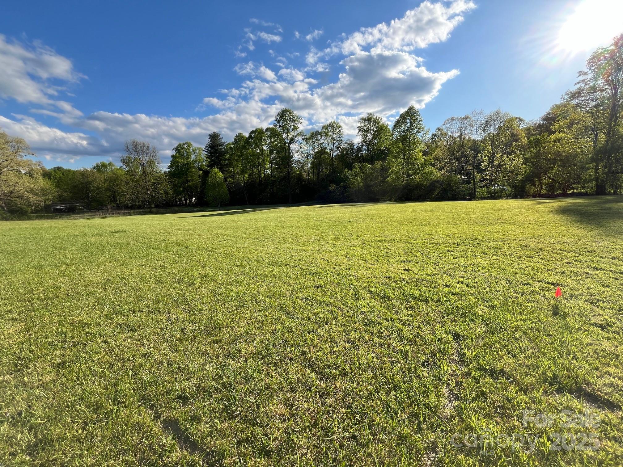 9999 Hunters Ridge Road, Unit 2 Mills River, NC 28759 - Photo 19 of 20 a view of an ocean and beach