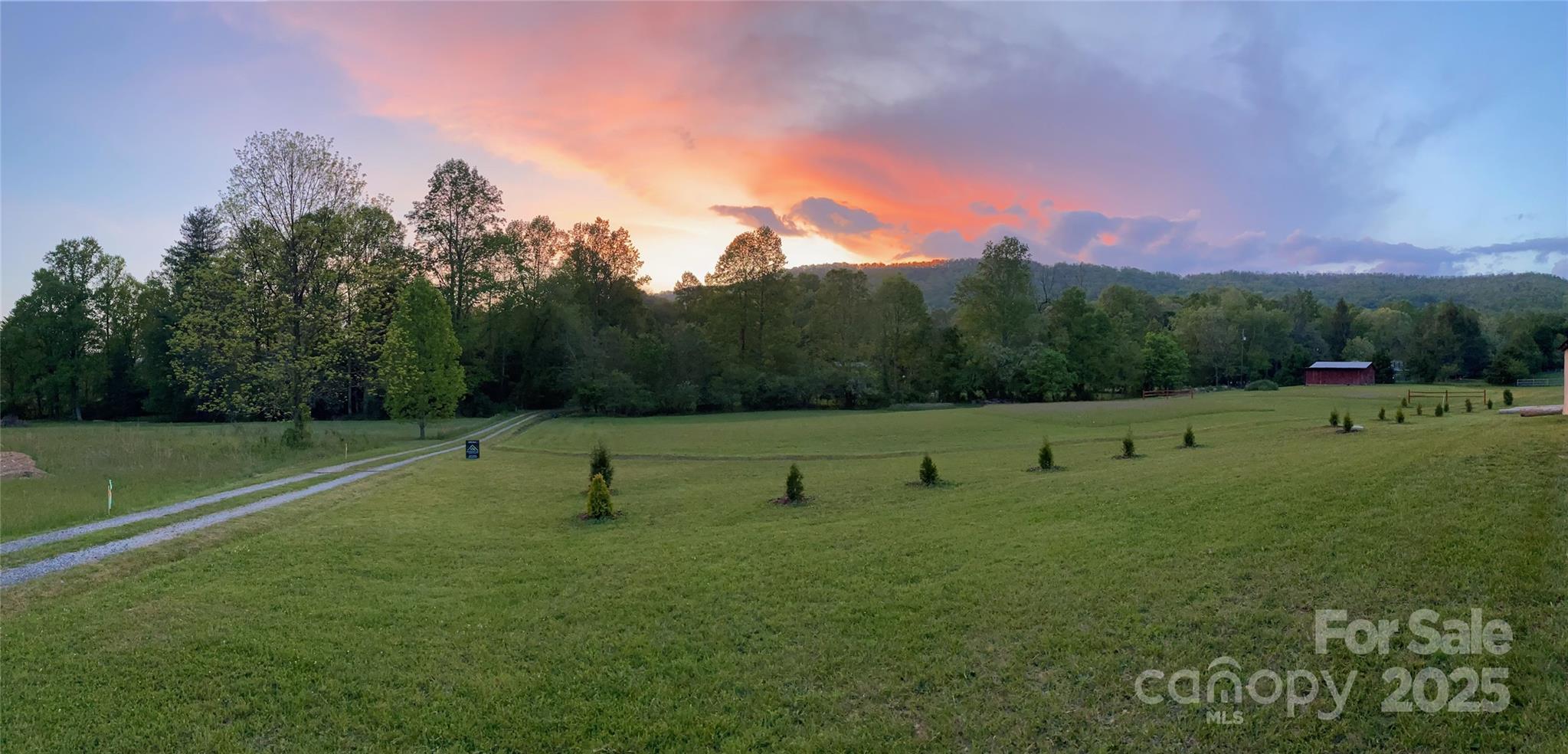 9999 Hunters Ridge Road, Unit 2 Mills River, NC 28759 - Photo 3 of 20 a view of outdoor space with green field
