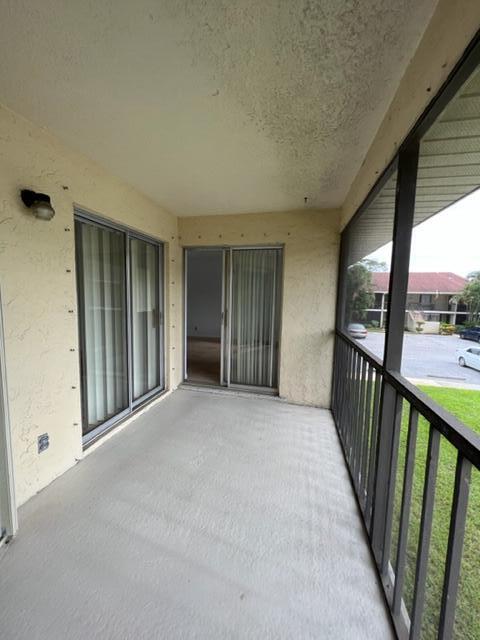 6532 Chasewood Drive, Unit F Jupiter, FL 33458 - Photo 13 of 17 a view of a hallway