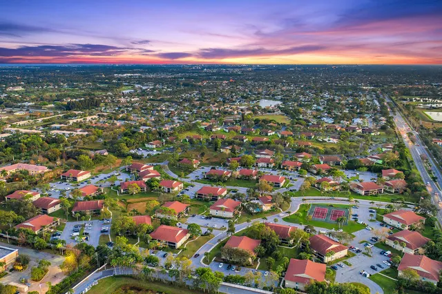 a view of city and green space