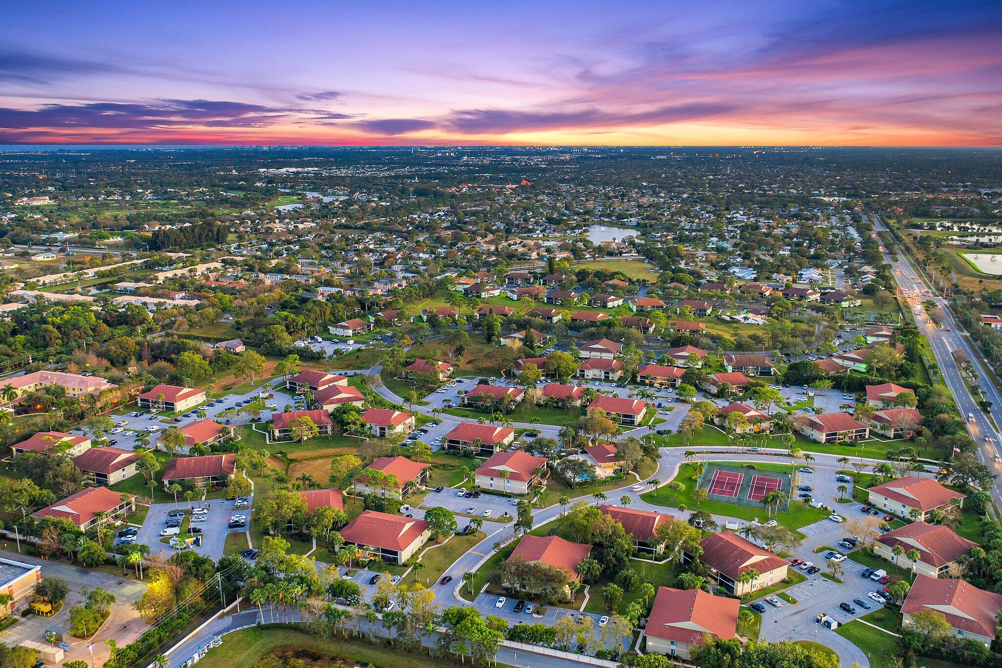 6532 Chasewood Drive, Unit F Jupiter, FL 33458 - Photo 2 of 17 a view of city and green space