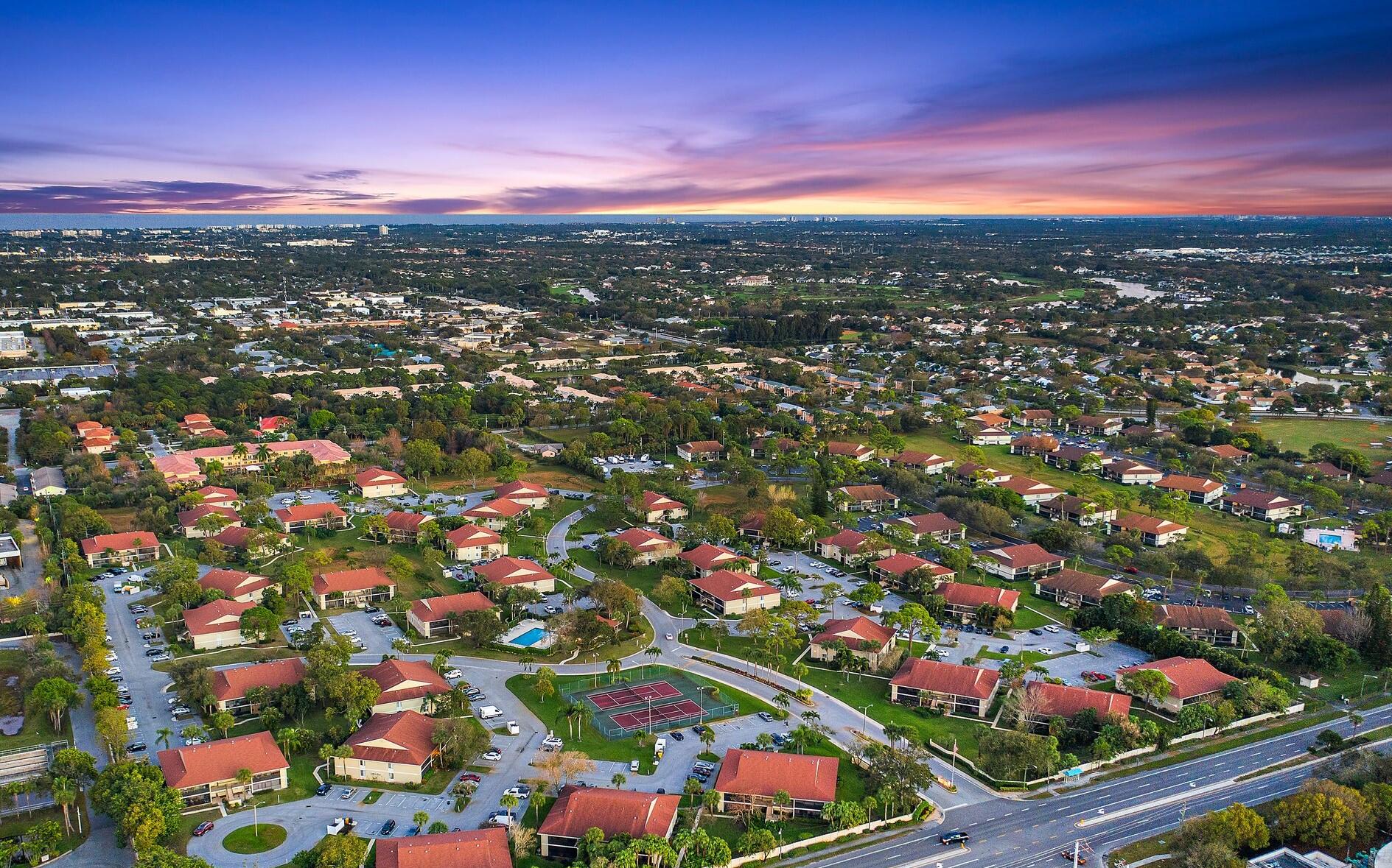 6532 Chasewood Drive, Unit F Jupiter, FL 33458 - Photo 4 of 17 a view of city and green space
