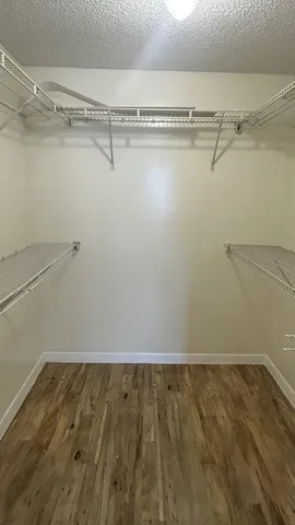 a view of a room with racks on the wall