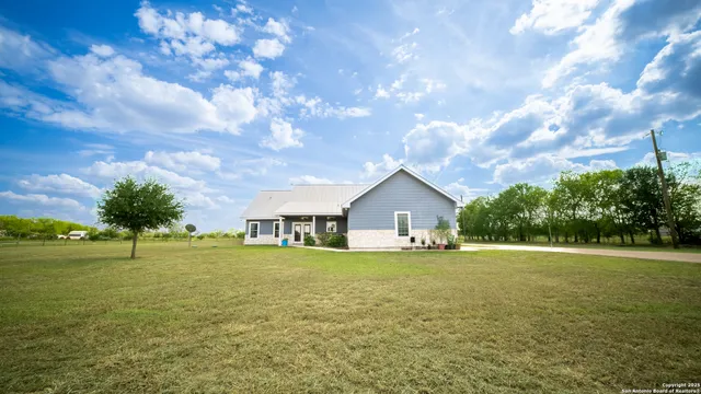 a view of house with outdoor space and street view