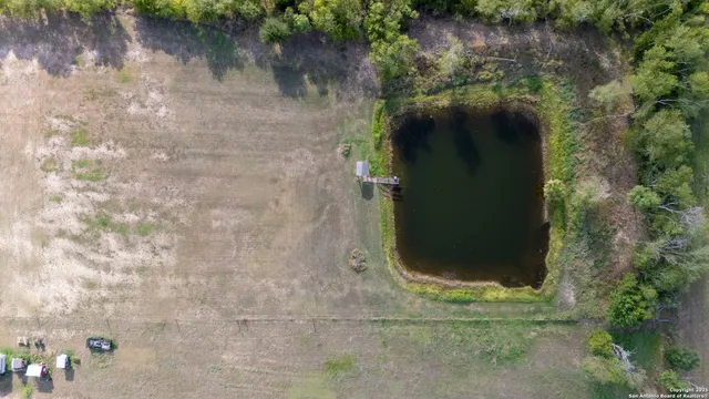 a view of a lake with a yard