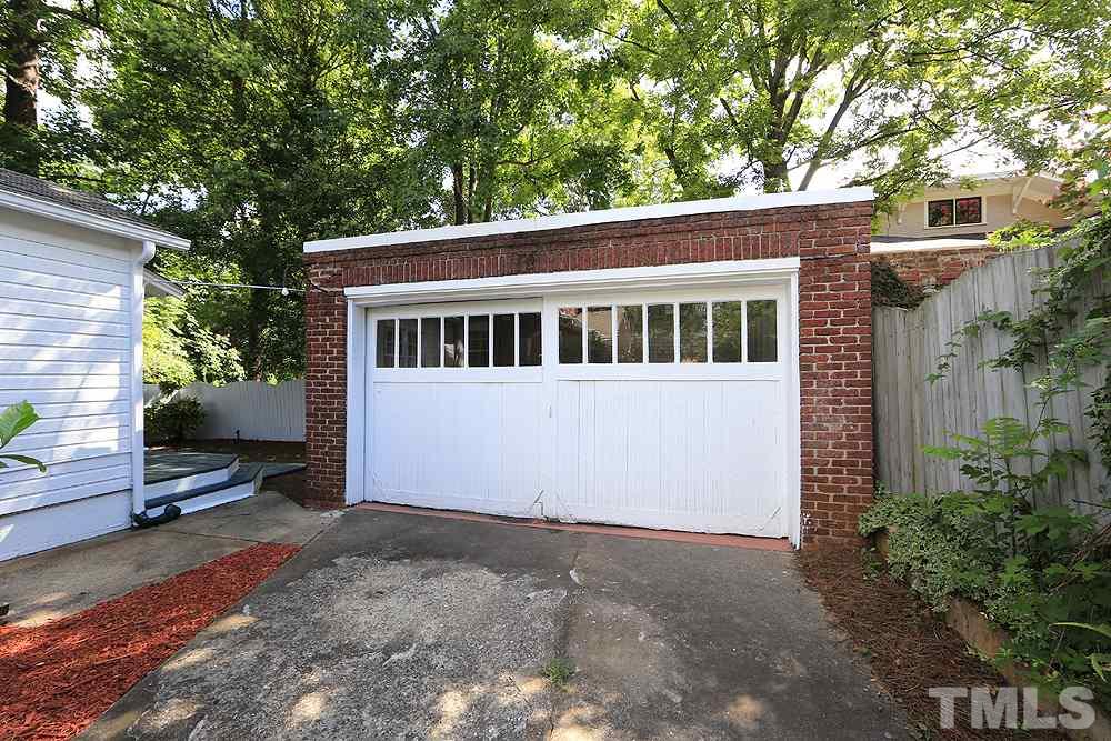 1906 Sunset Drive Raleigh, NC 27608 - Photo 19 of 21 a view of a house with a yard
