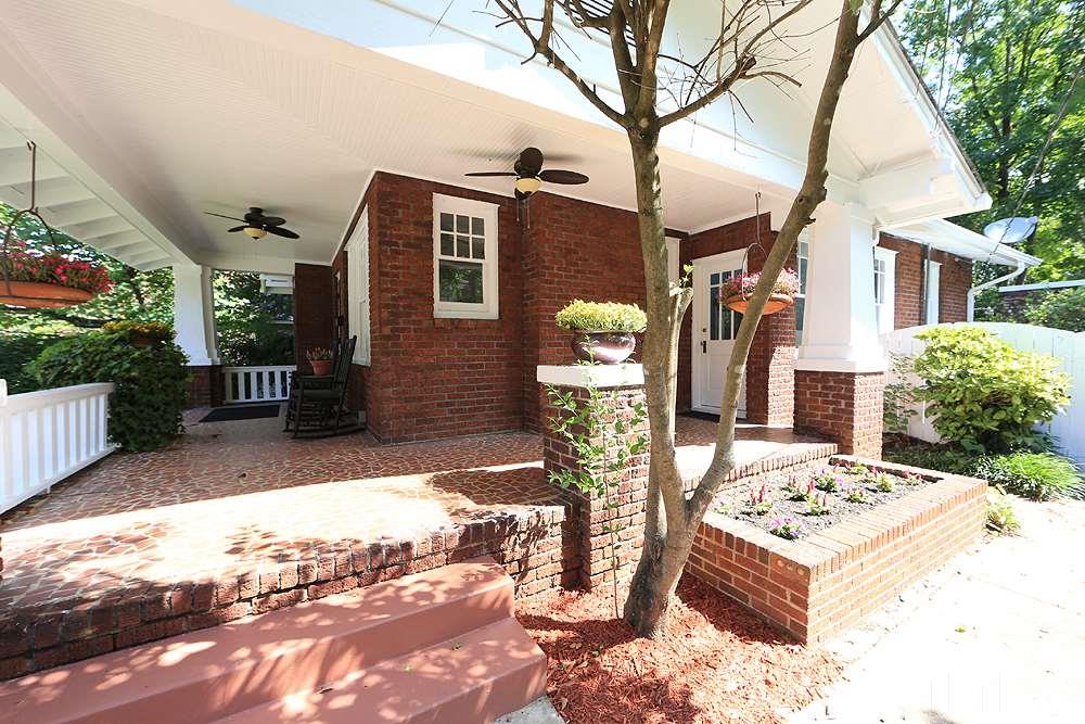 1906 Sunset Drive Raleigh, NC 27608 - Photo 3 of 21 a front view of a house with parking