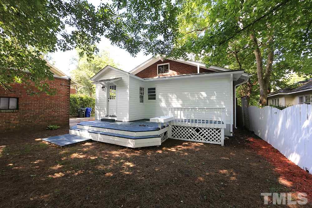 1906 Sunset Drive Raleigh, NC 27608 - Photo 21 of 21 a front view of a house with a garden