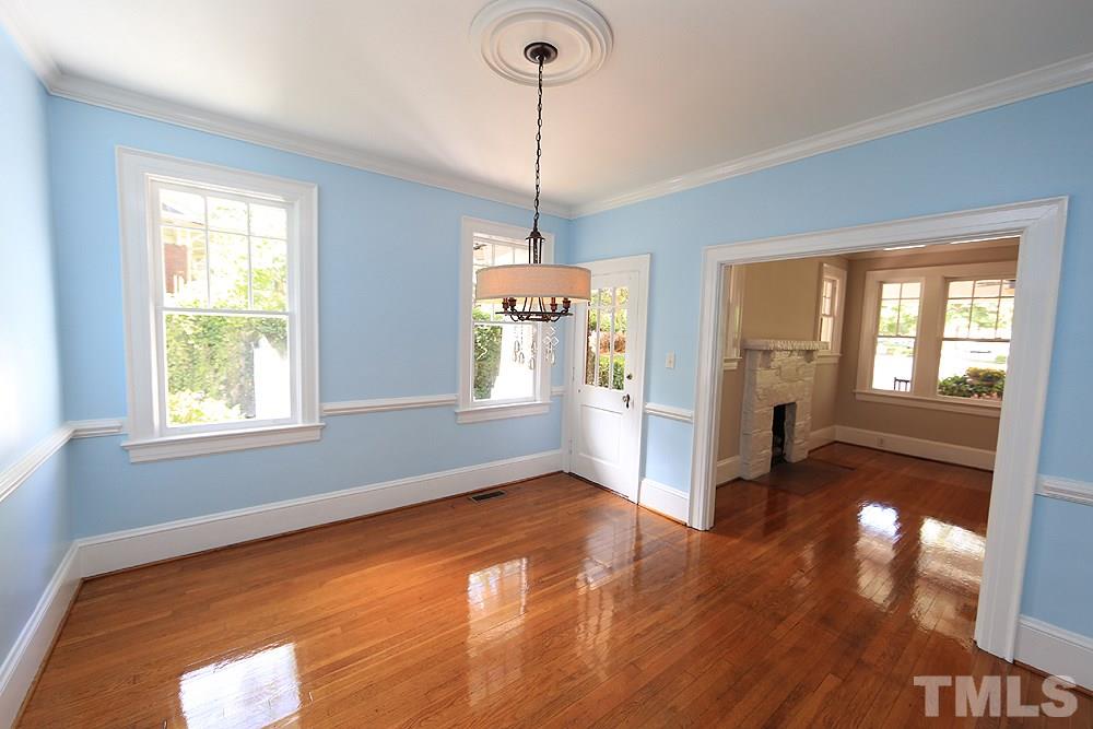 1906 Sunset Drive Raleigh, NC 27608 - Photo 7 of 21 a view of a room with window and wooden floor