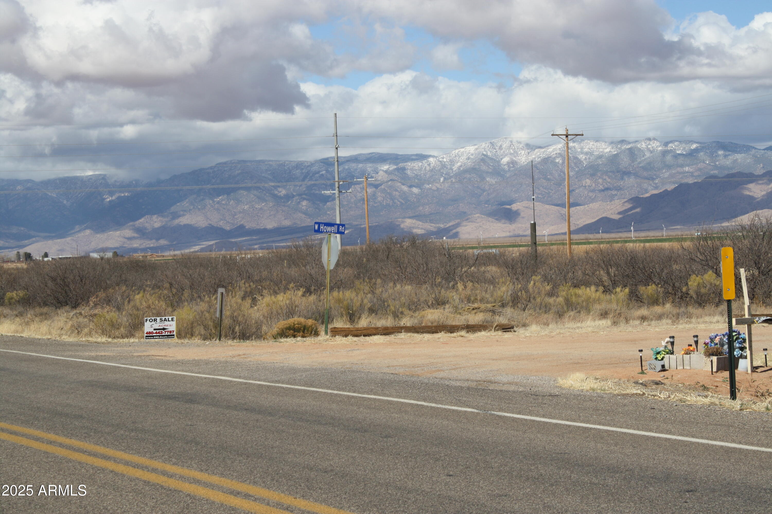5886 West Howell Road, Unit 13 AND 20 Willcox, AZ 85643 - Photo 27 of 29 a view of a road with a big house