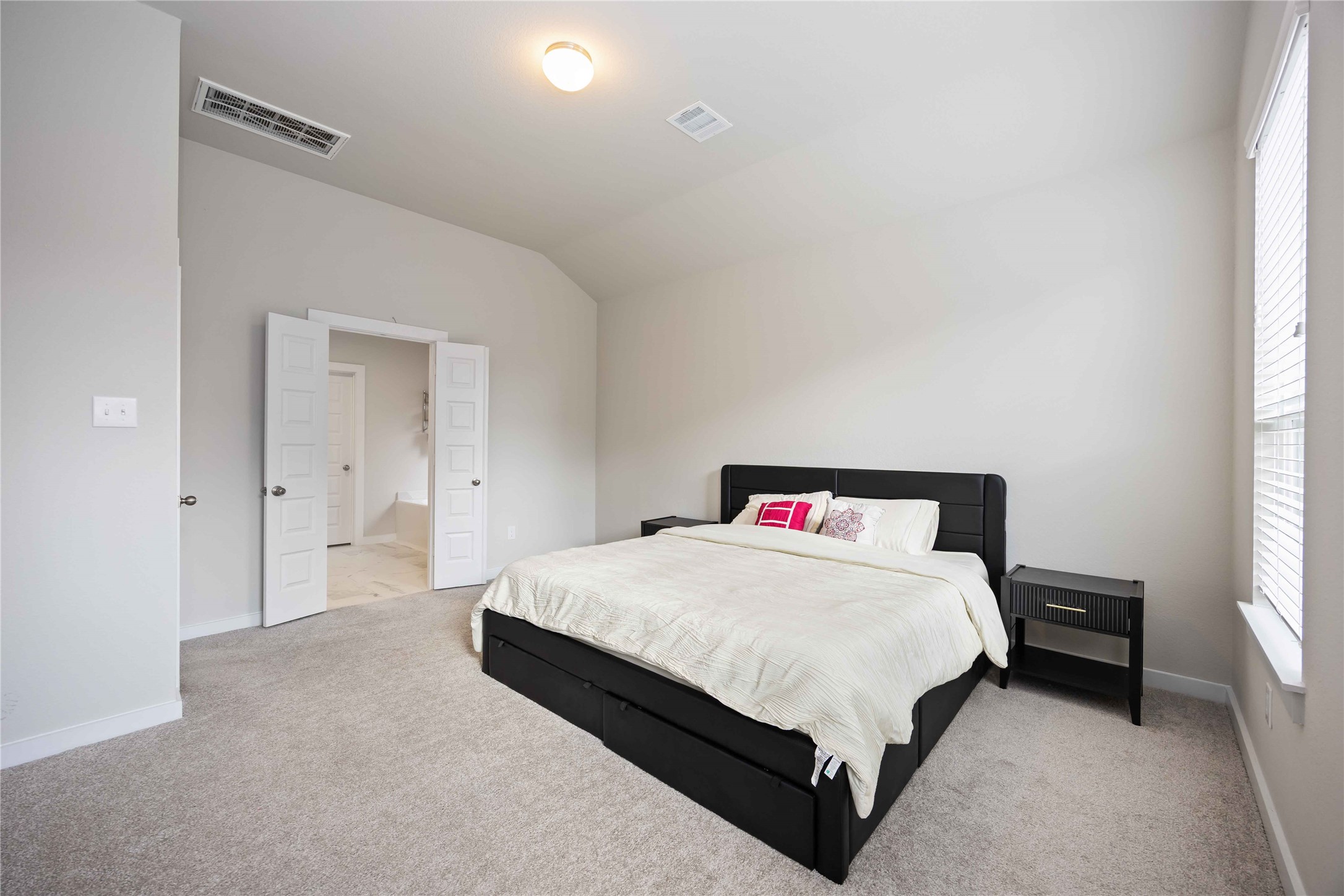 15038 Timberson Rdg Lane Houston, TX 77090 - Photo 17 of 29 a bedroom with a bed and a window