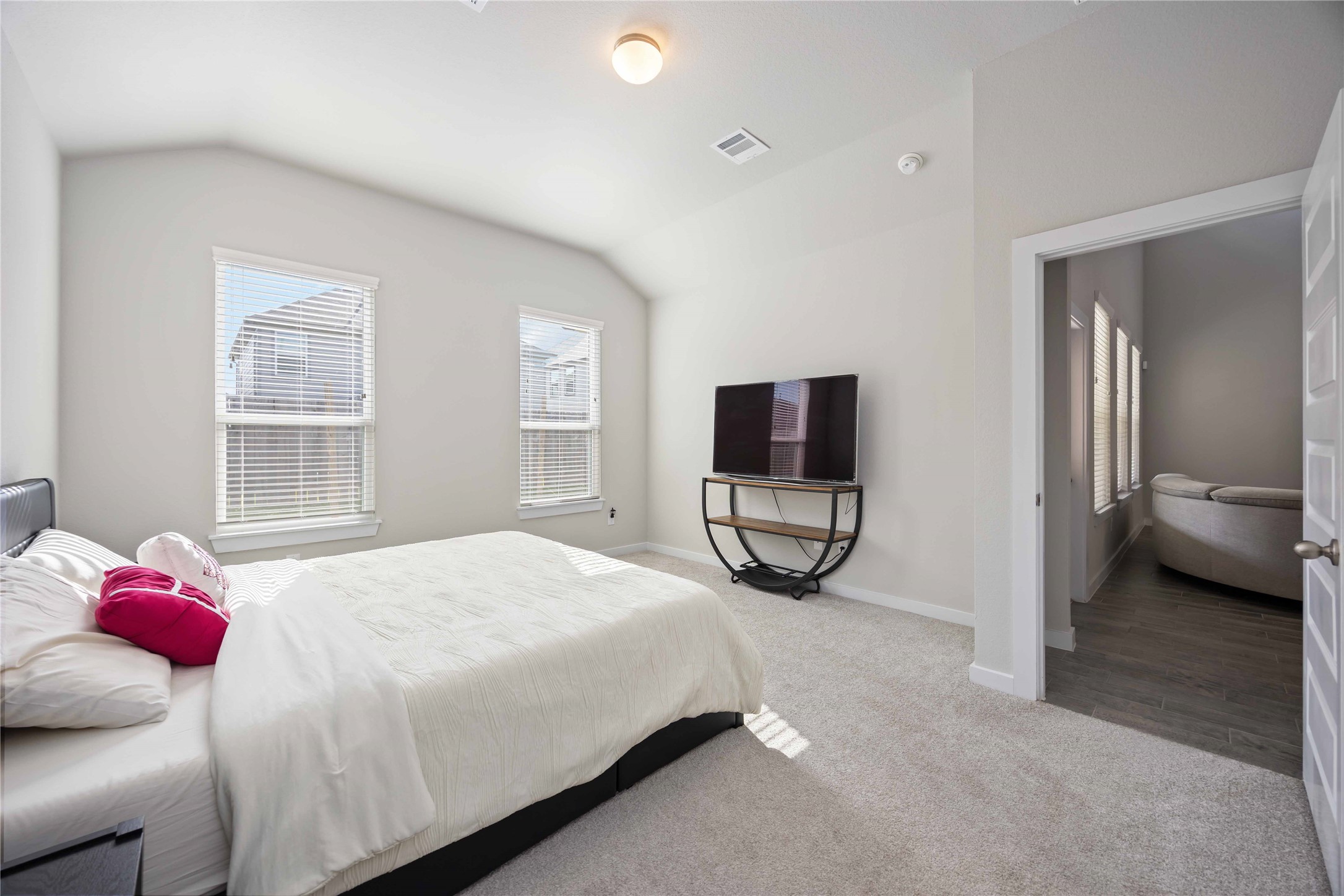 15038 Timberson Rdg Lane Houston, TX 77090 - Photo 18 of 29 a bedroom with a bed and glass door