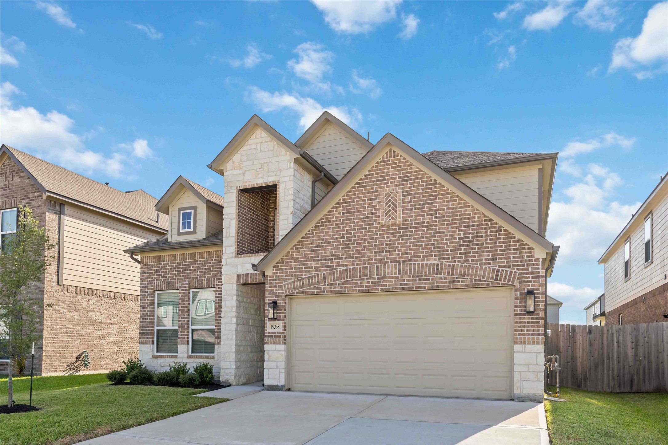 15038 Timberson Rdg Lane Houston, TX 77090 - Photo 2 of 29 a view of a house with a yard