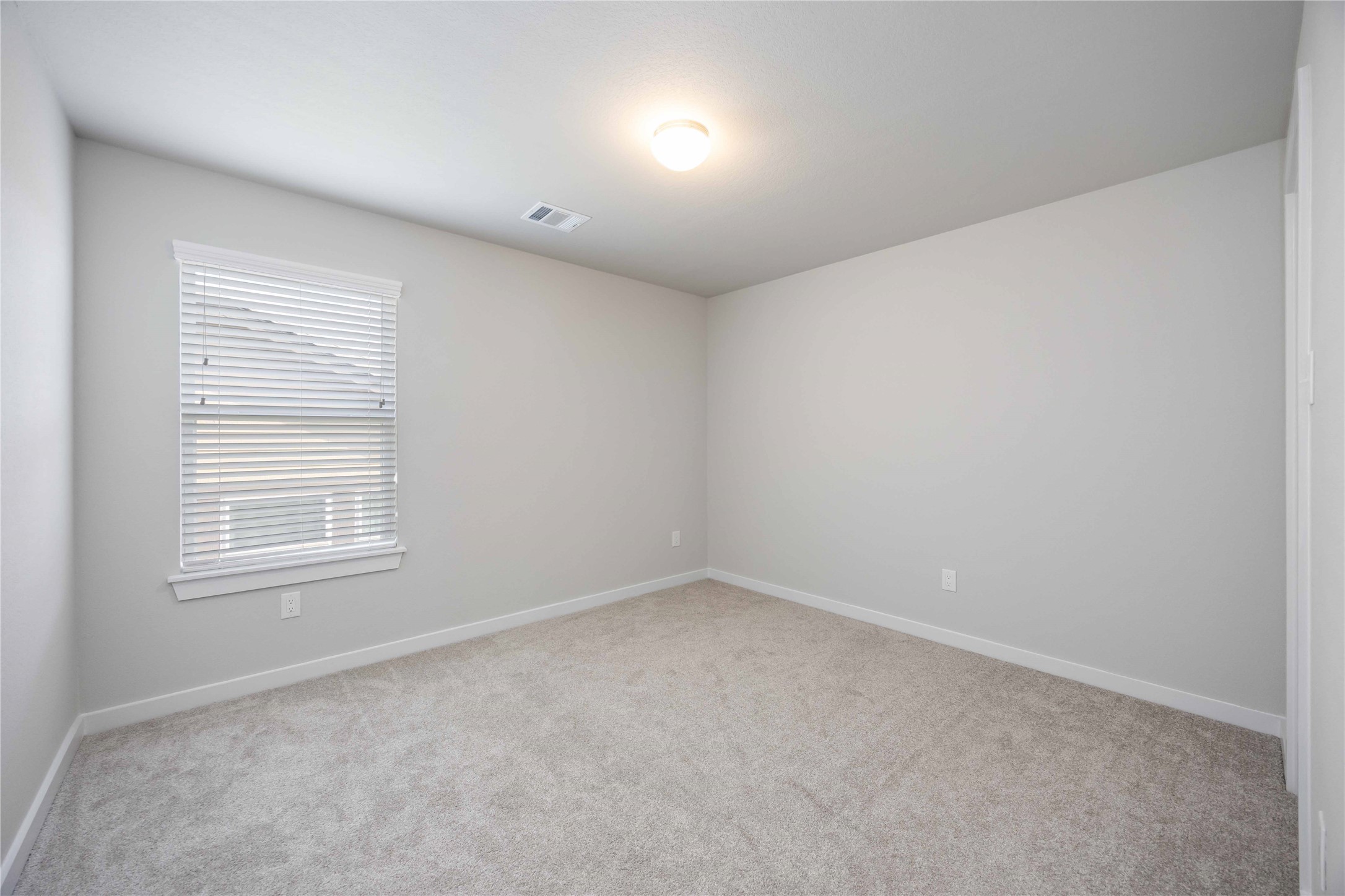 15038 Timberson Rdg Lane Houston, TX 77090 - Photo 24 of 29 an empty room with a window
