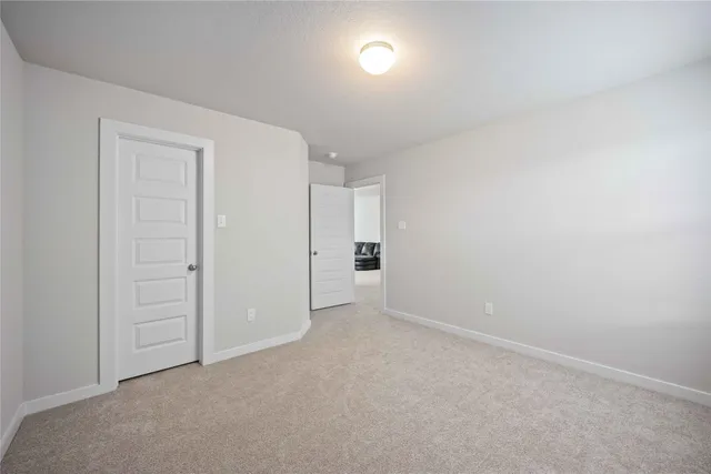 an empty room with an entryway