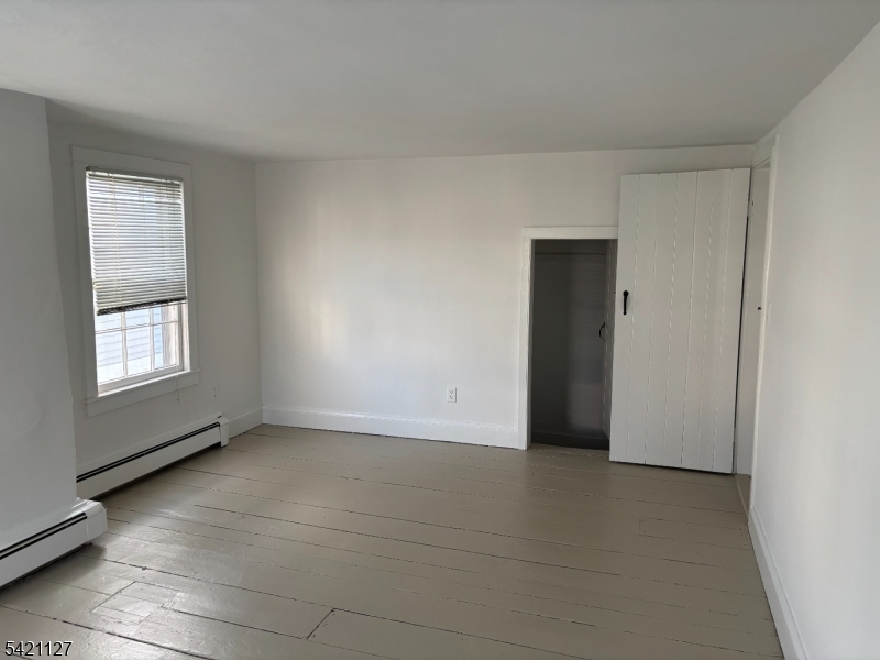 43 Old Turnpike Road Oldwick, NJ 08858 - Photo 15 of 18 a view of an empty room with a window