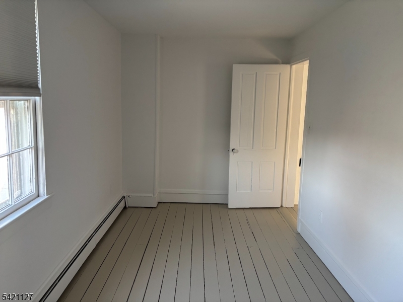 43 Old Turnpike Road Oldwick, NJ 08858 - Photo 17 of 18 a view of a room with wooden floor and window