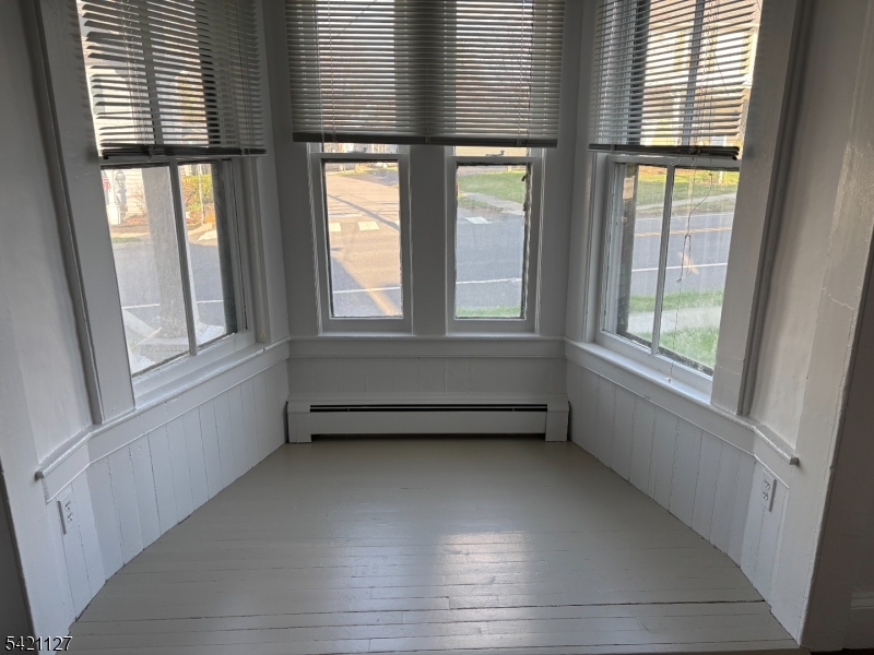 43 Old Turnpike Road Oldwick, NJ 08858 - Photo 9 of 18 a view of an empty room with a window