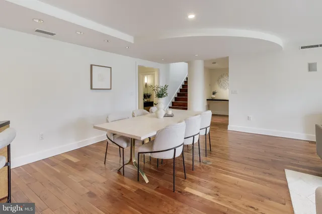a kitchen with stainless steel appliances granite countertop wooden cabinets and sink