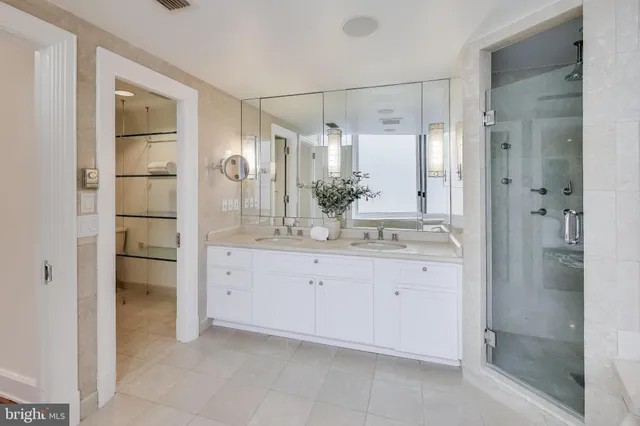 a view of a living room with hardwood floor
