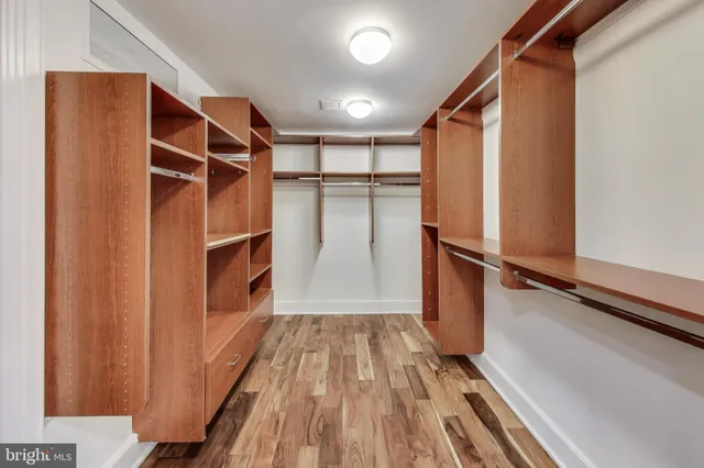 a view of a storage & utility room with washer and dryer