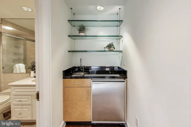 a view of balcony with furniture