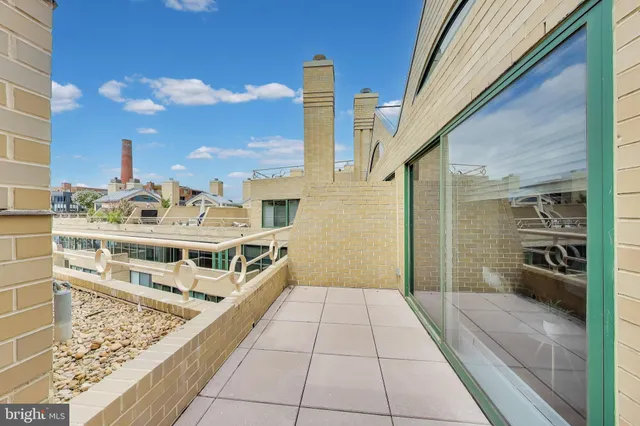 a view of a terrace with seating space