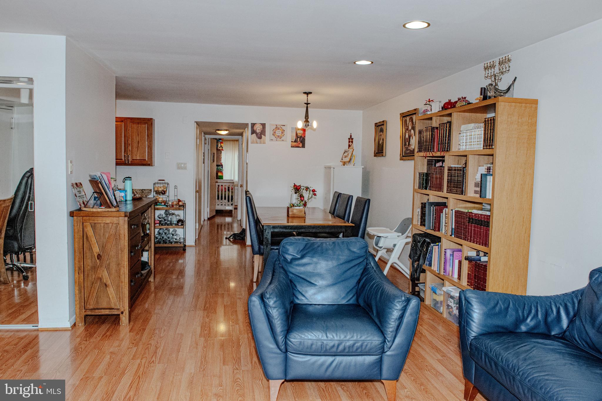 9908 Bustleton Avenue, Unit A8 Philadelphia, PA 19115 - Photo 4 of 24 a living room with furniture and a book shelf