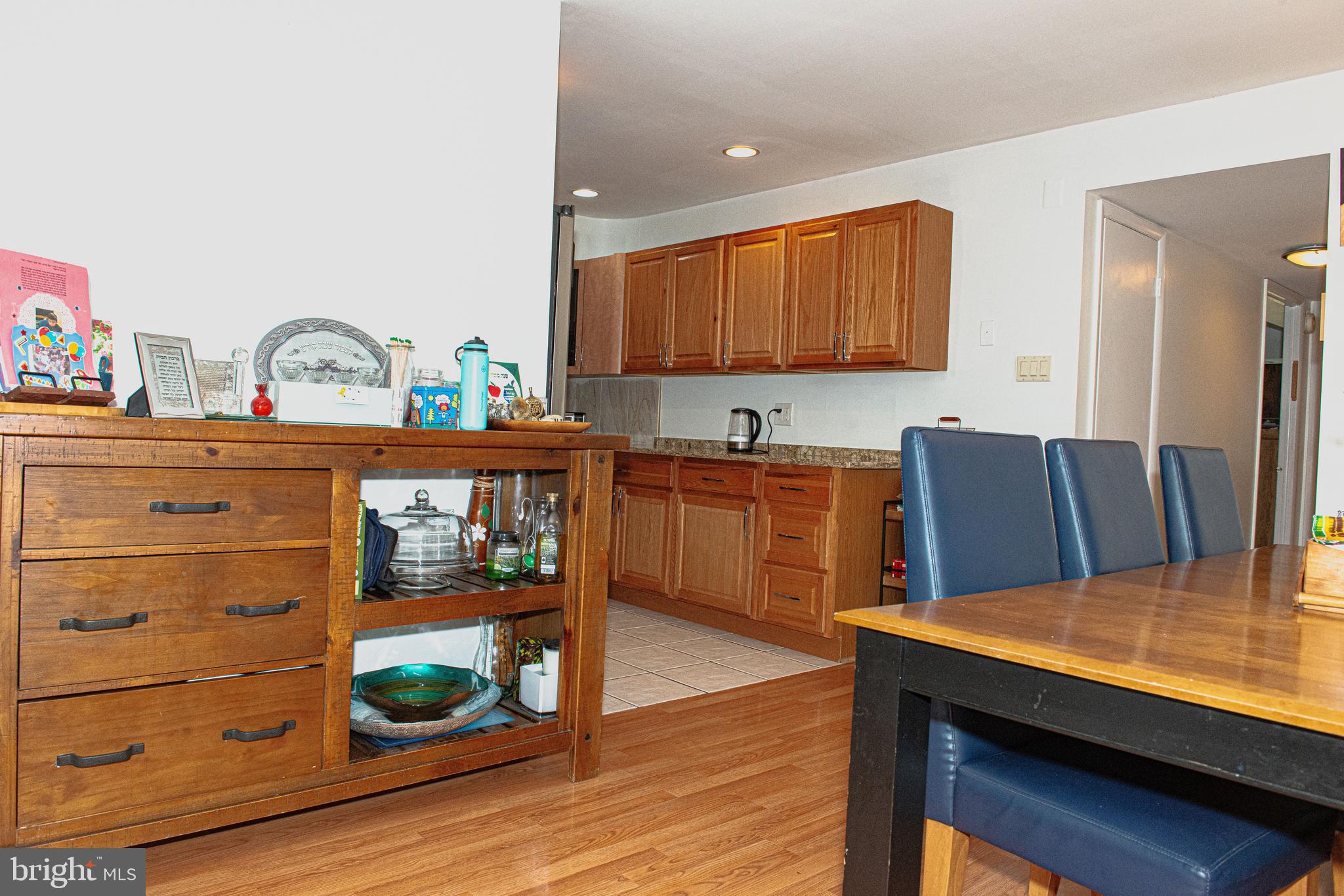9908 Bustleton Avenue, Unit A8 Philadelphia, PA 19115 - Photo 6 of 24 a view of kitchen with cabinets and wooden floor
