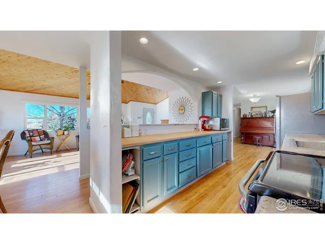 a kitchen with a stove and a microwave