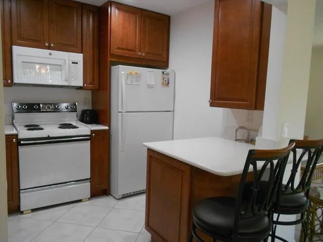 a utility room with washer and dryer