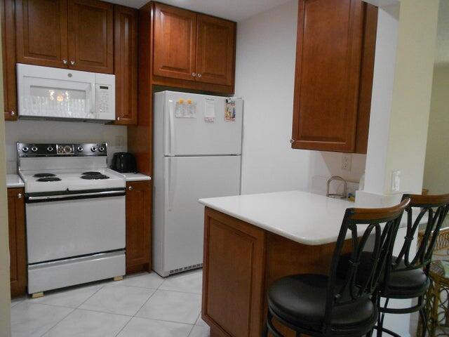 a utility room with washer and dryer