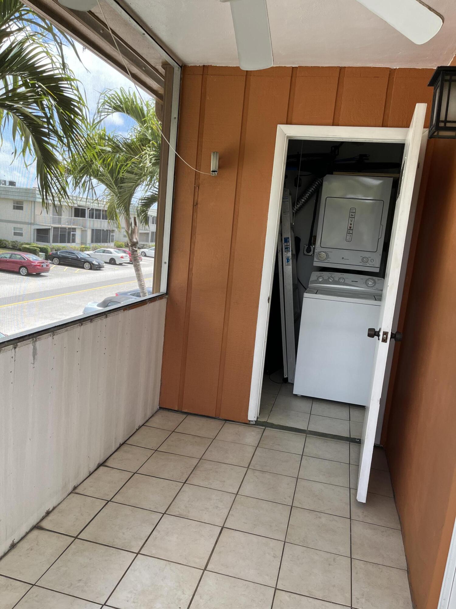 457 Flanders I, Unit 457 Delray Beach, FL 33484 - Photo 10 of 13 a view of a storage and utility room