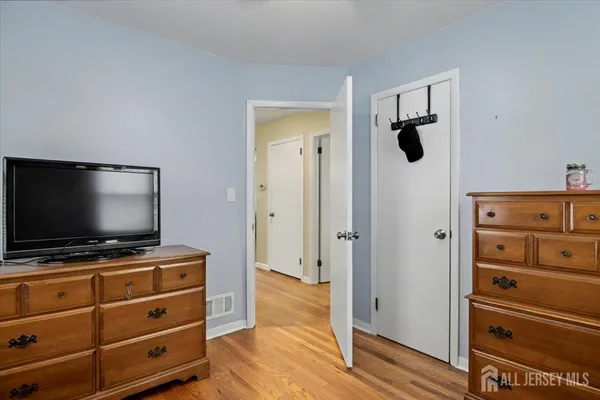 a view of a livingroom with wooden floor